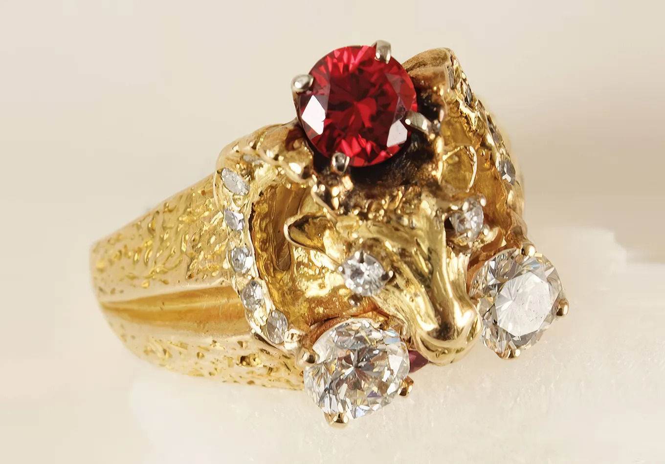 Elvis Presley's Personally Owned 1.30ctw Diamond and 14K Yellow Gold Capricorn Ring with Red Spinel Accents. Presley's Capricorn Ring Misses Mark at High-Profile Auction. US