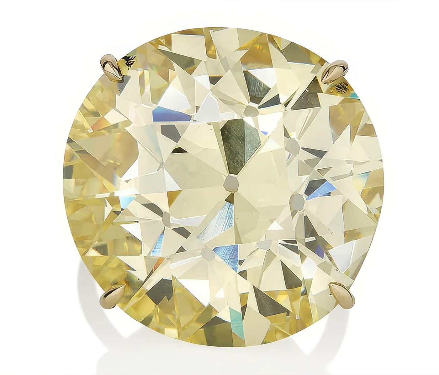 Top view of 40.54-carat fancy yellow diamond ring. Phillips Geneva Sale to Feature 6M Dollars Blue Diamond, Rare Emeralds, and Ruby Masterpieces. US