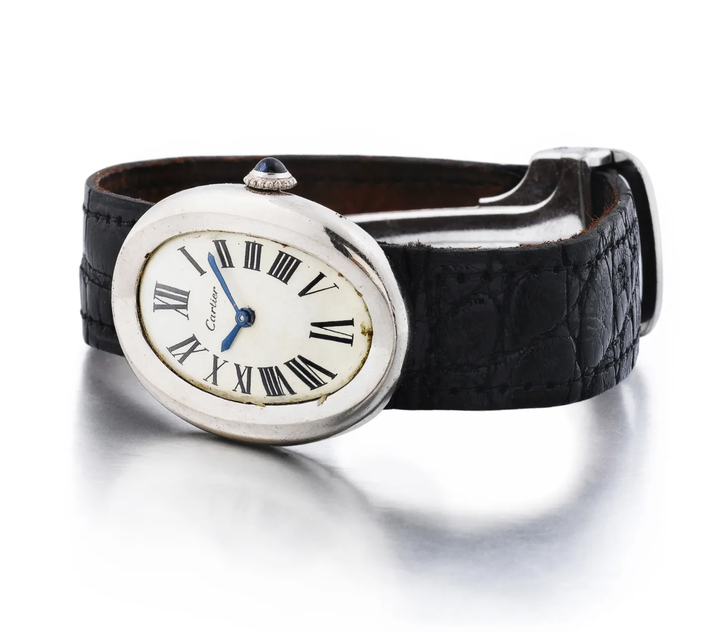 Oval white gold case and black leather band Cartier “Baignoire” watch. Historic Jewelry Auction Astounds Everyone with Shirley Bassey’s Glamorous Collection. US