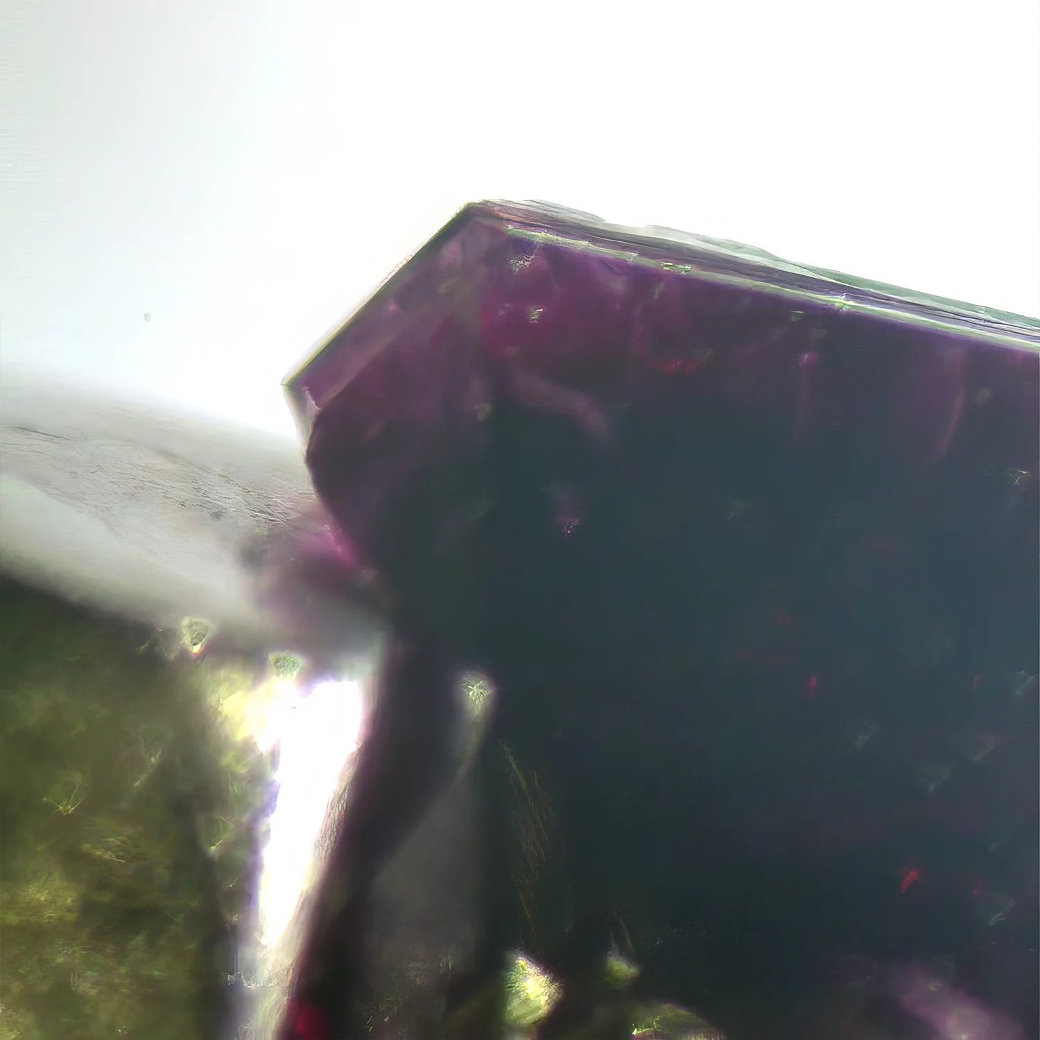 A ruby crystal growing in-situ. The New Lab Technology That Makes Growing Rubies Possible. US