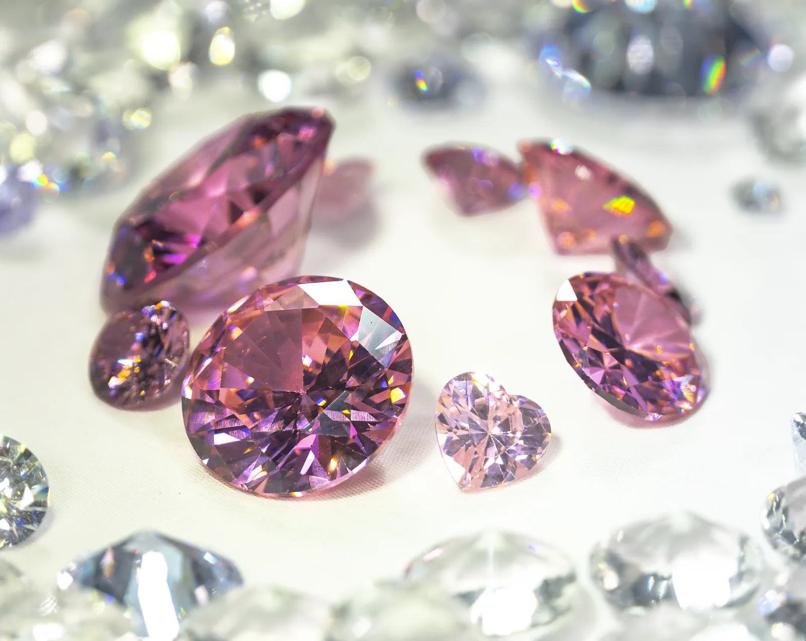 Rose diamonds. Round-cut and heart-cut pink diamonds. US Justice Department Targets Toronto Man in Multi-Million Dollar Investment Scam. US