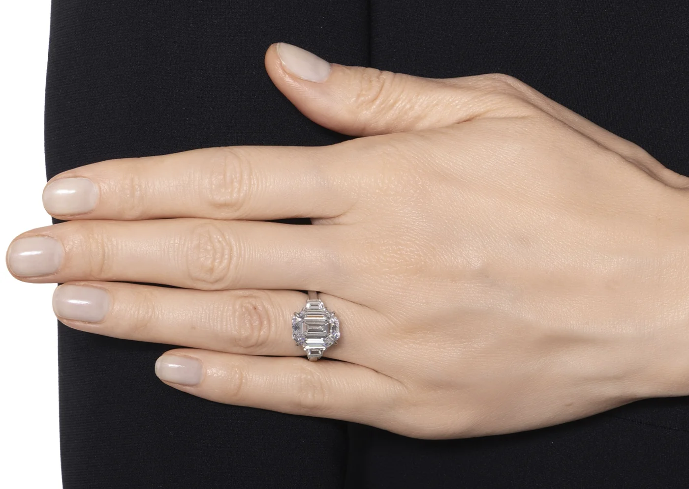 7ct diamond white gold ring on the finger. Sotheby’s Winter Auction Shines with Iconic Jewelry and Charitable Contributions. US