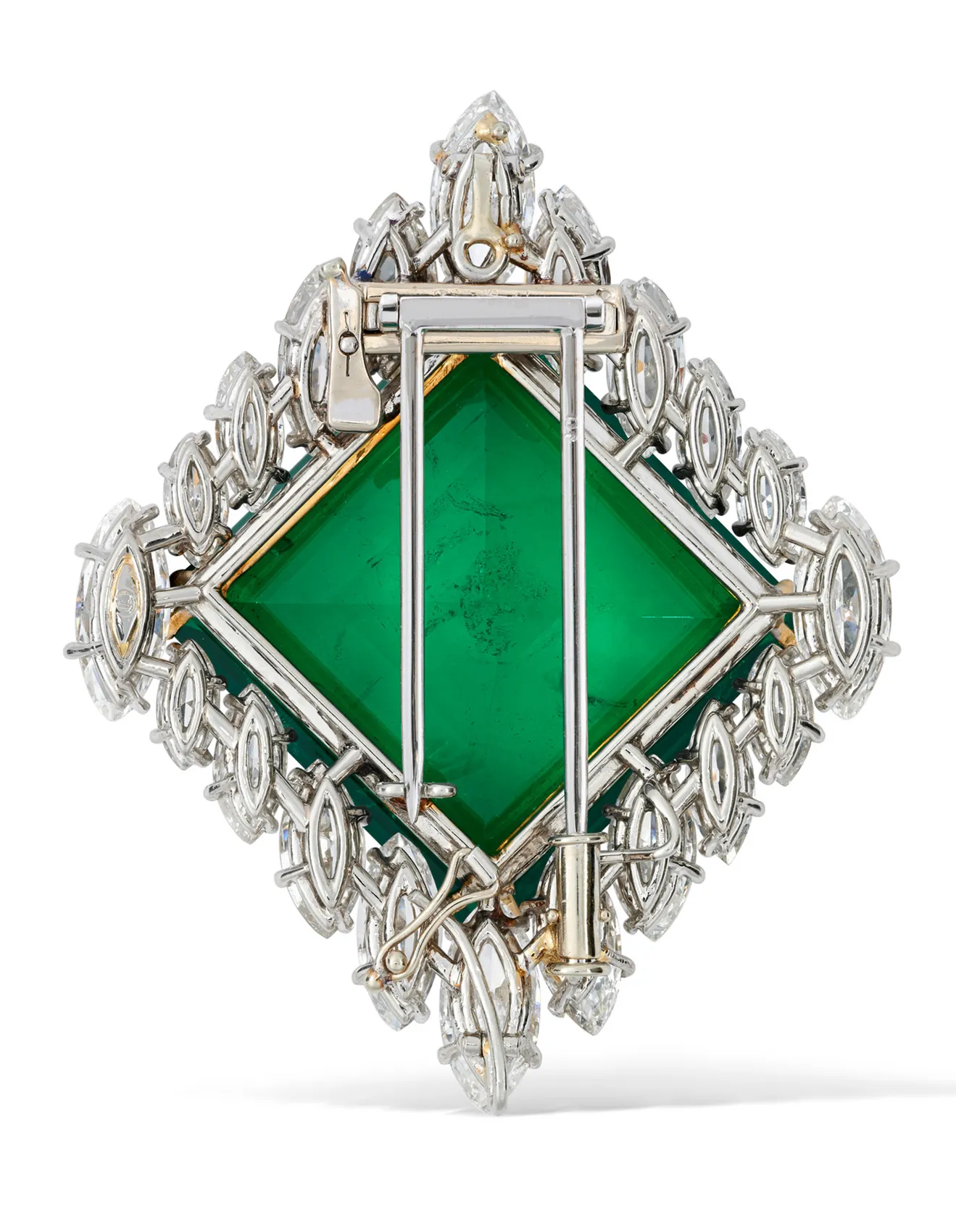 Gold brooch with Colombian emerald 37 carat, rear view. From Love to Legacy: The Story Behind the World’s Most Expensive Emerald. US