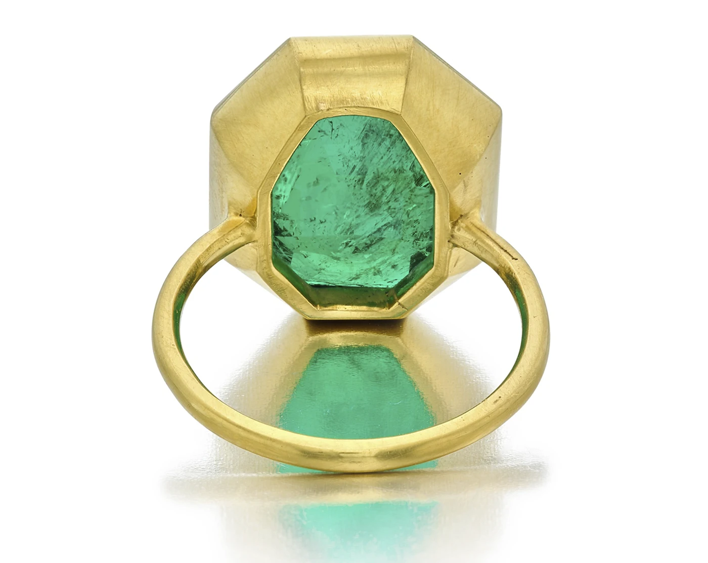 Bezel set octagonal-shaped step cut 10.97carat emerald ring, bottom view. Sotheby’s Winter Auction Shines with Iconic Jewelry and Charitable Contributions. US