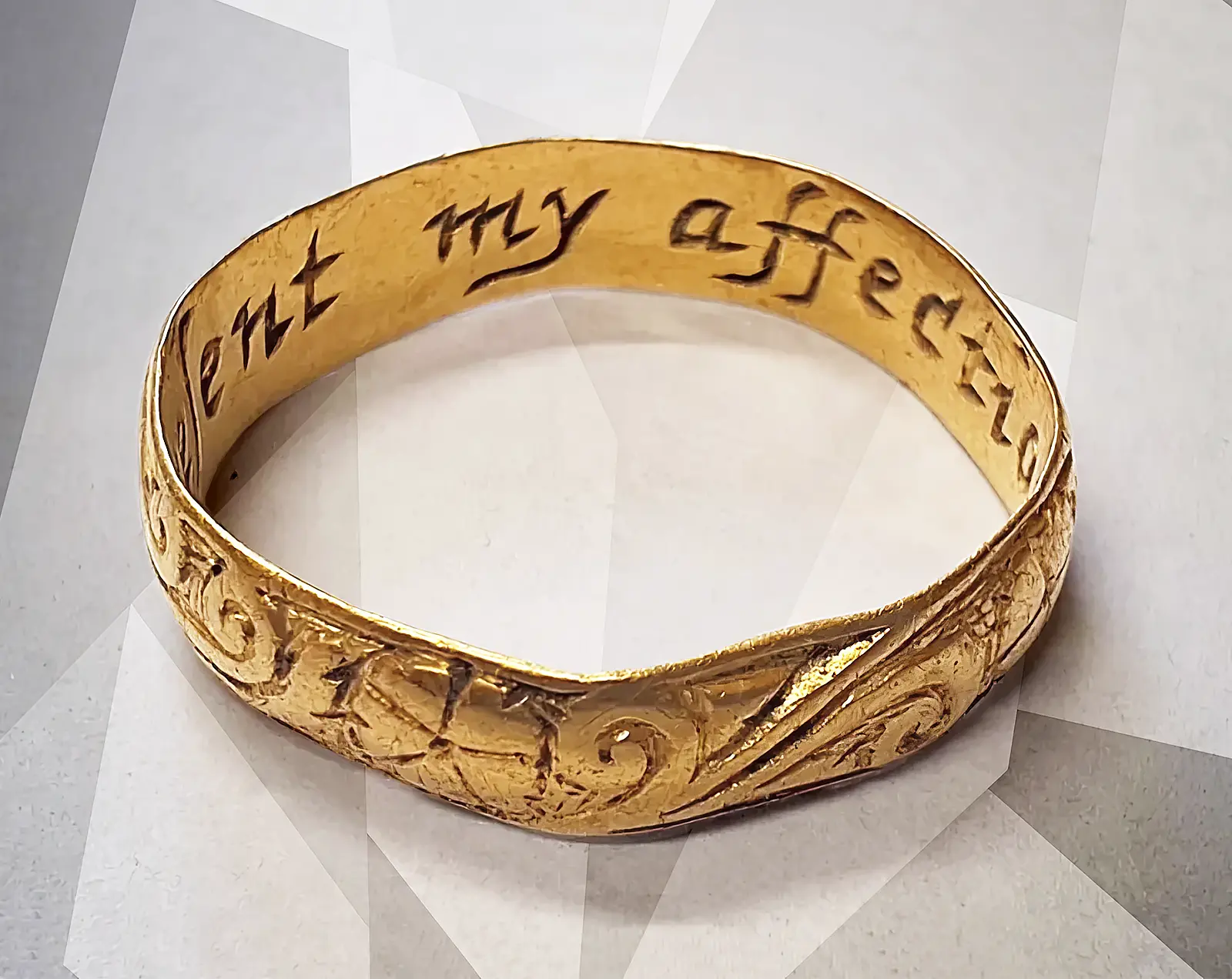 A centuries old gold ring with the inscription Present My Affection was found at Whittington Hall, Lancashire. Treasure Beneath Our Feet: 17th-Century Gold Ring Found on Estate. News