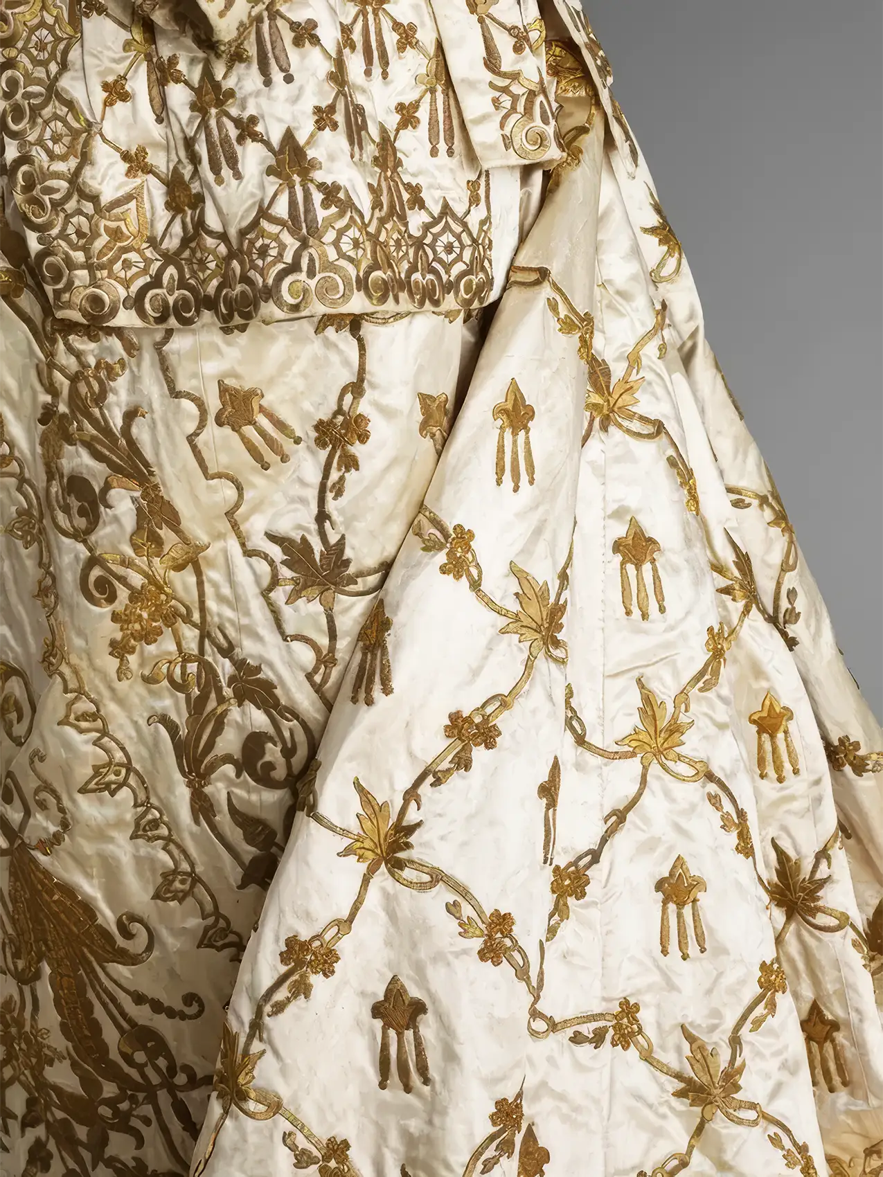 A detail of the 19th-century Egyptian wedding gown from the 'Golden Thread' exhibition. Woven in Gold: Paris Show Traces the History of Gilded Fashion. News