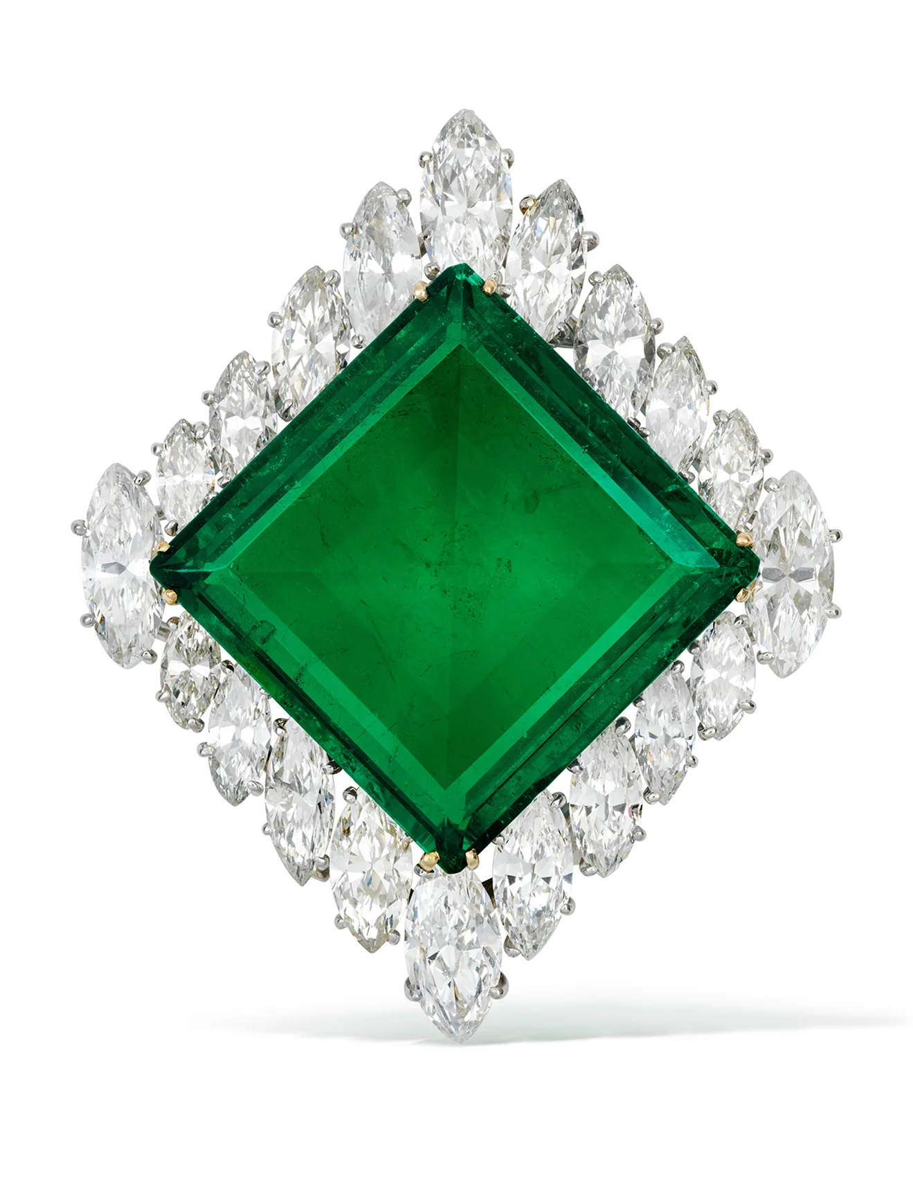 Gold brooch with central colombian emerald of 37 carat, marquise diamond, front view. From Love to Legacy: The Story Behind the World’s Most Expensive Emerald. US