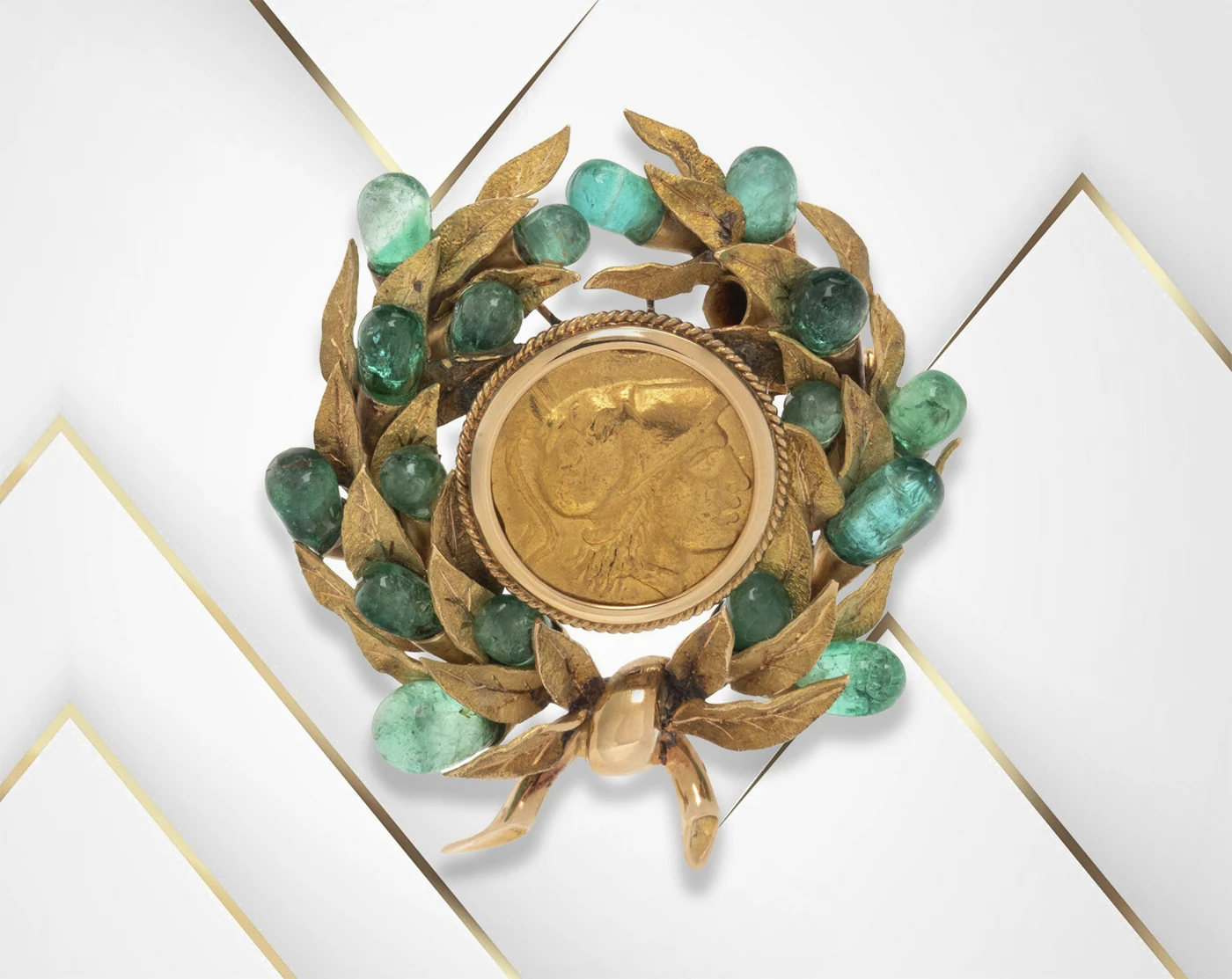 Gold emerald brooch. Stunning Brooch of Jacqueline Kennedy Stuns at Auction. News