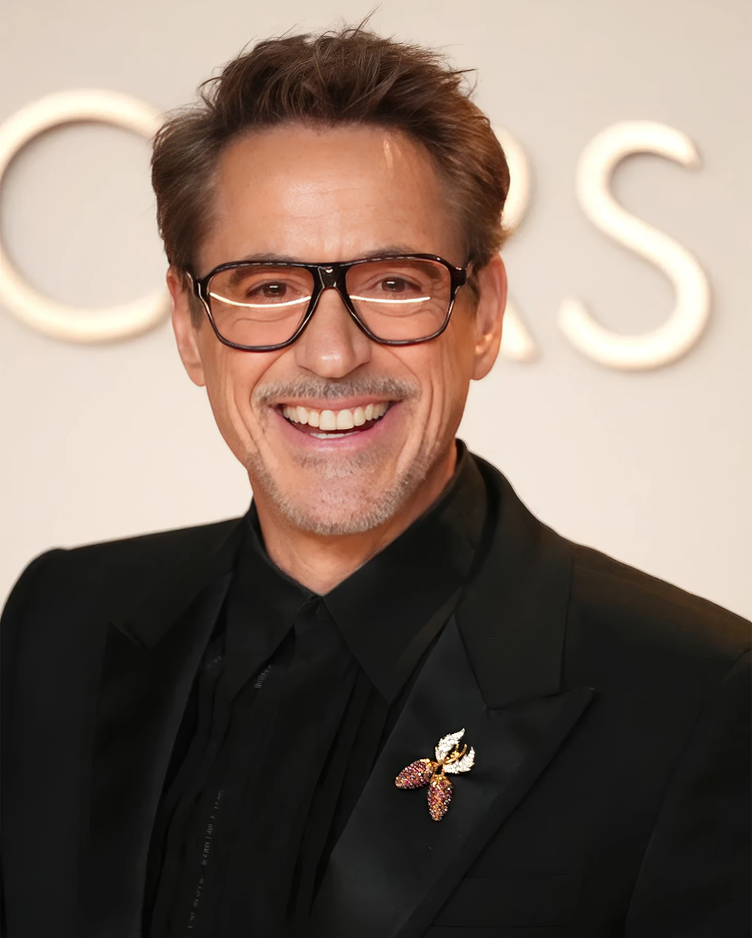 Robert Downey Jr. Jean Schlumberger vintage brooch for Tiffany. The 6 Most Stunning Jewelry Moments from the 2025 Oscars—For Both Women & Men. News