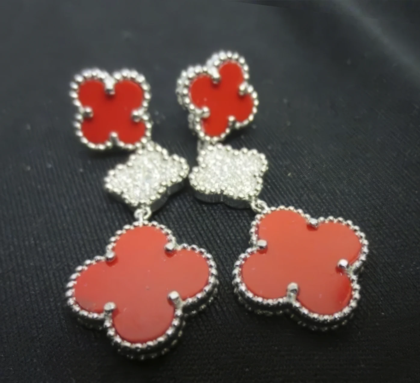 Almost 2,000 Fake Van Cleef and Arpels Jewelry Pieces Seized in El Paso. News | Olertis Fake Gold Van Cleef Diamond and Coral Earrings. Almost 2,000 Fake Van Cleef & Arpels Jewelry Pieces Seized in El Paso. News