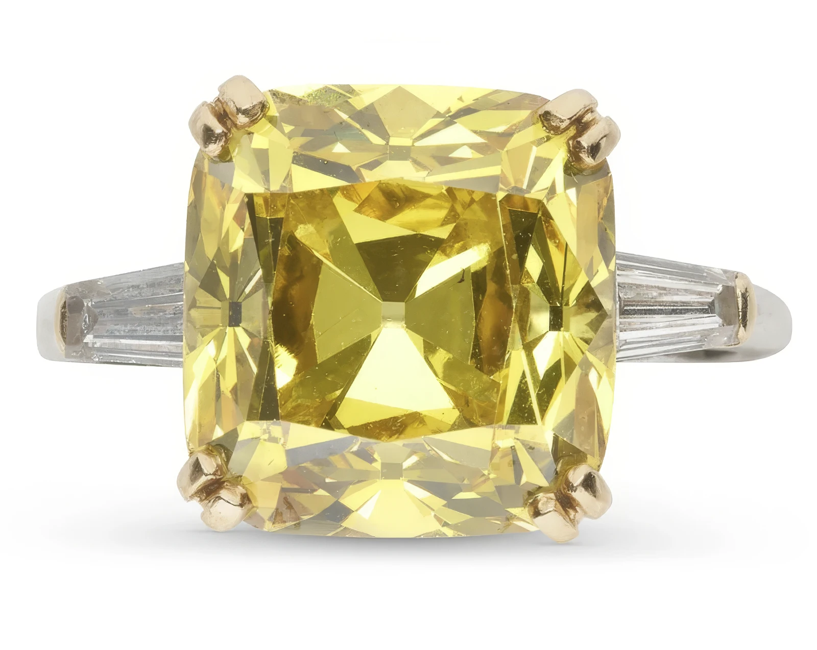 Masterpieces from Famous Design Houses Will Be Displayed at Christie’s Paris Online Auction. News | Olertis A 9.66-ct fancy vivid orange and yellow diamond of high clarity in a cushion brilliant cut ring with baguette accents. Masterpieces from Famous Design Houses Will Be Displayed at Christie’s Paris Online Auction. News