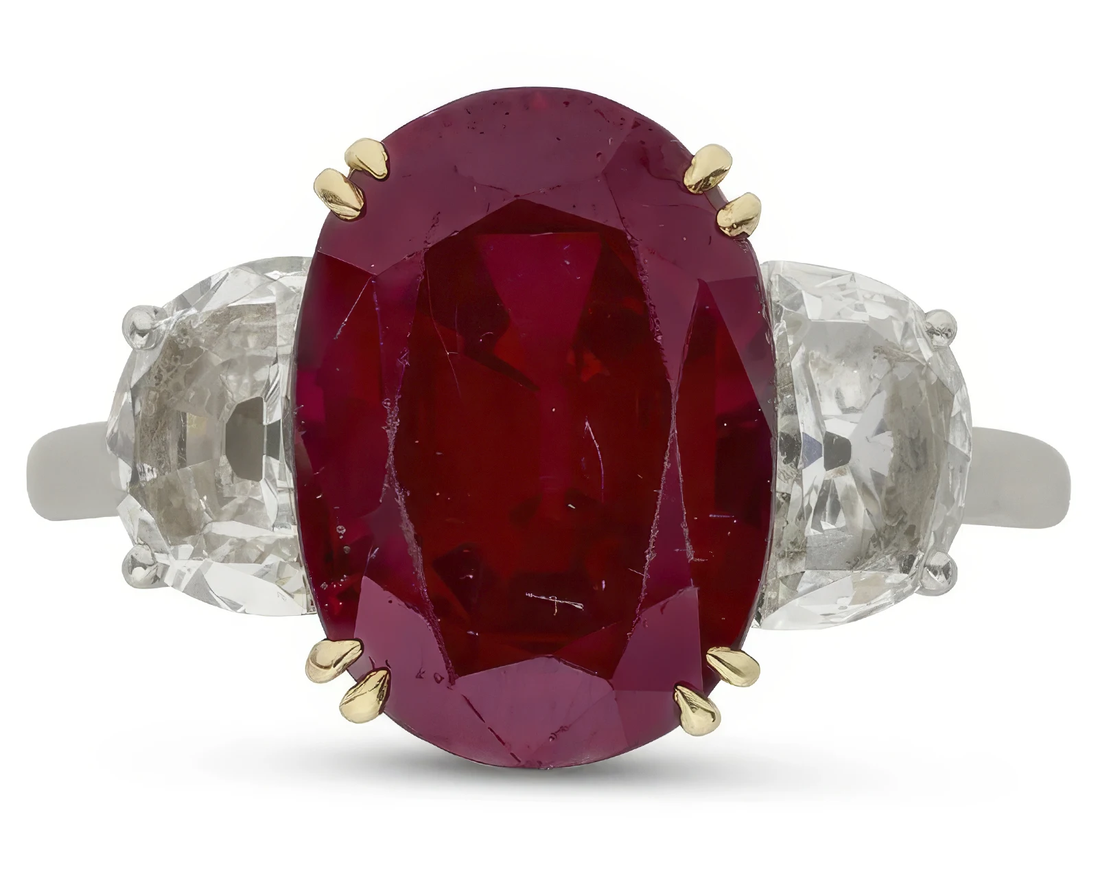 Masterpieces from Famous Design Houses Will Be Displayed at Christie’s Paris Online Auction. News | Olertis A stunning ring with a 6.2-ct oval Burmese ruby at its center and half moon diamonds totaling 1.91-cts on both sides. Van Cleef and Arpels. Masterpieces from Famous Design Houses Will Be Displayed at Christie’s Paris Online Auction. News