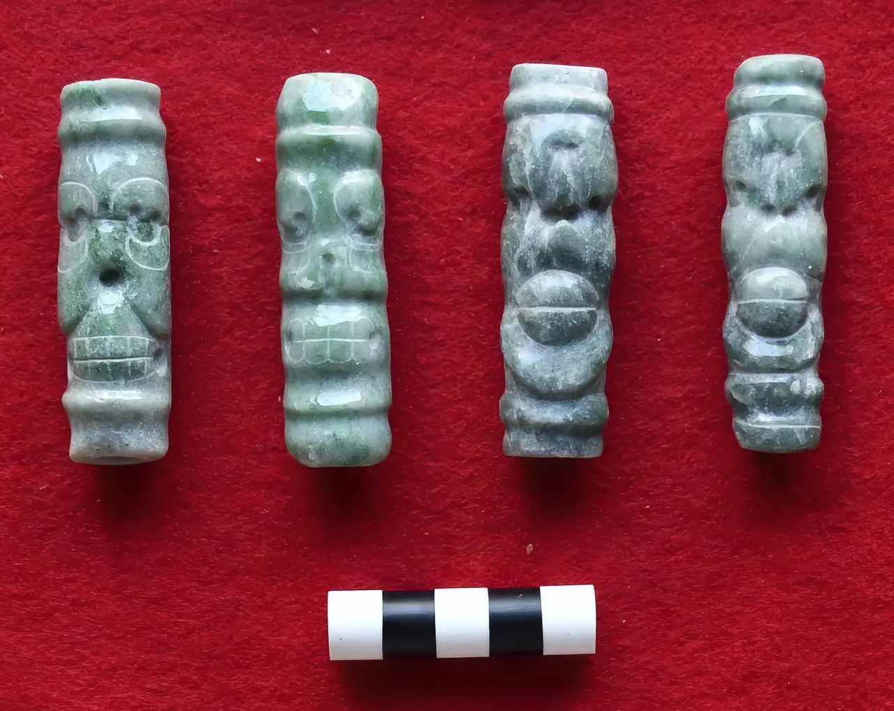 The Secrets of an Ancient Tomb of a Mayan King Discovered in Belize. News | Olertis Four jadeite tube shaped beads depicting both living and deceased spider monkeys. The Secrets of an Ancient Tomb of a Mayan King Discovered in Belize. News
