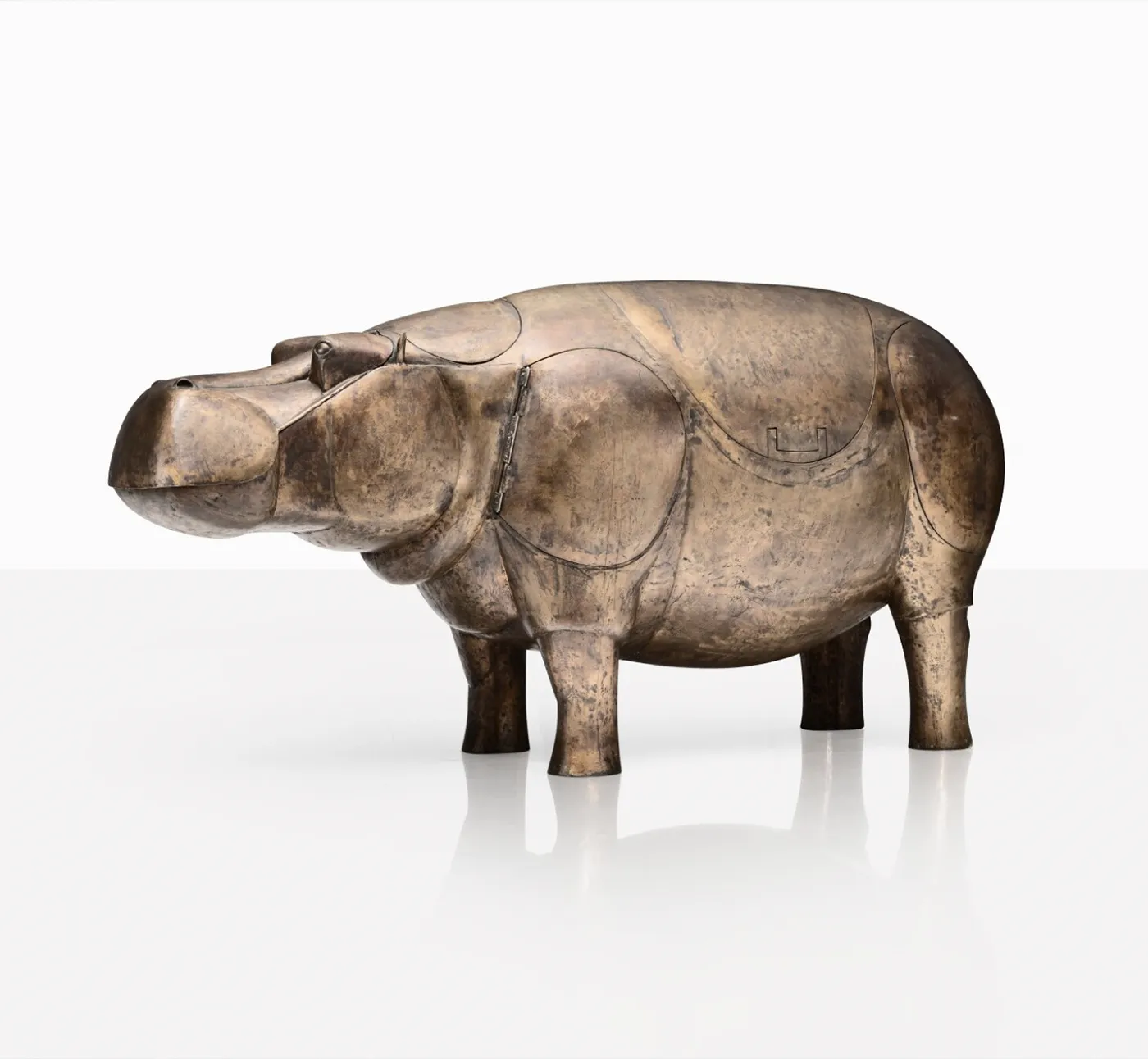 Sotheby’s Will Auction Anne Schlumberger’s Collection of Jewelry & Art. News | Olertis A 1976 bar sculpture by François-Xavier Lalanne, crafted from copper, nickel silver, stainless steel, brass, and painted wood, shaped as a hippopotamus. Side view. Sotheby’s Will Auction Anne Schlumberger’s Collection of Jewelry & Art. News