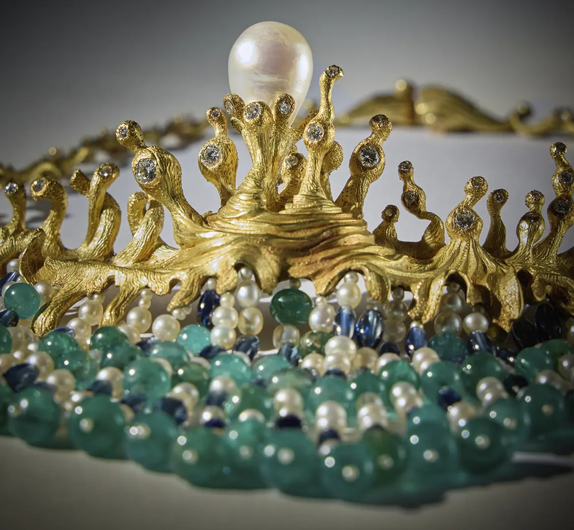 Sotheby’s Will Auction Anne Schlumberger’s Collection of Jewelry & Art. News | Olertis The Salvador-Dalí-styled Swirling Sea custom necklace. Its untraditional design features pearls, sapphires, diamonds, and emeralds. It was designed in 1954 and was made from 18k gold by Carlos Alemany a decade later in New York. Bottom view. Sotheby’s Will Auction Anne Schlumberger’s Collection of Jewelry & Art. News