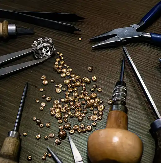 Jewelry tools, pure gold, and a crown design ring. Learn about gemstone options, pricing, metals, CAD steps, and shipping security. Your complete Olertis custom jewelry FAQ & terms guide.. US